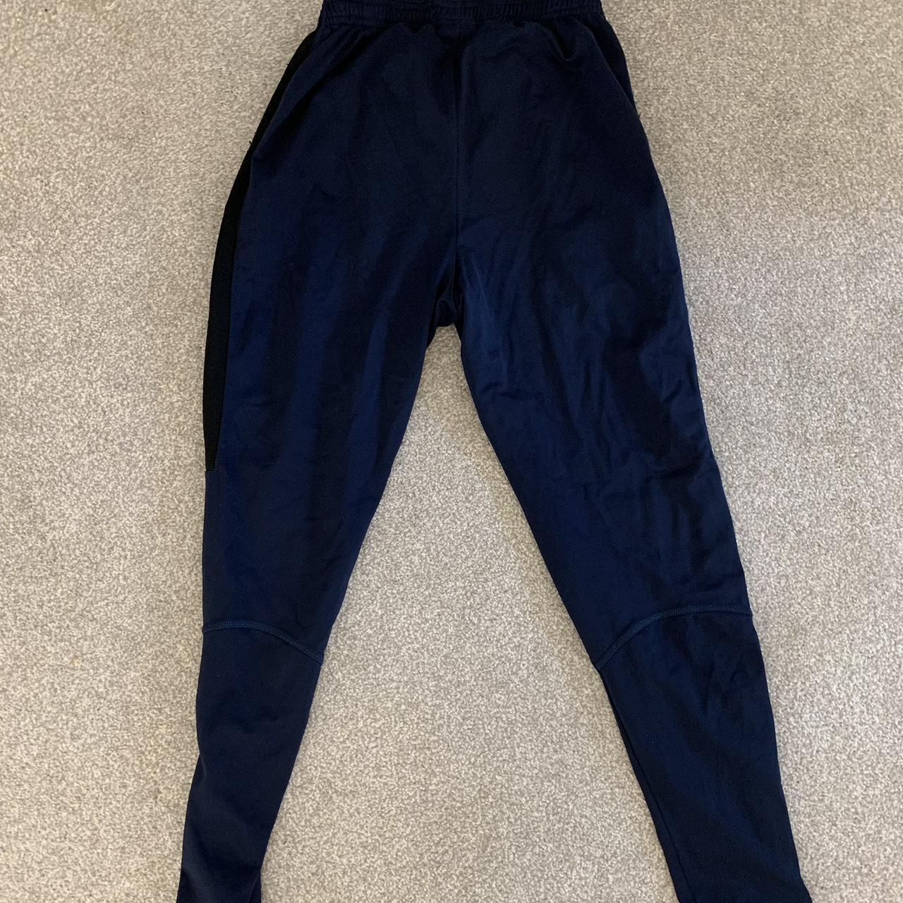 kids navy blue, white and black nike dri-fit joggers... - Depop