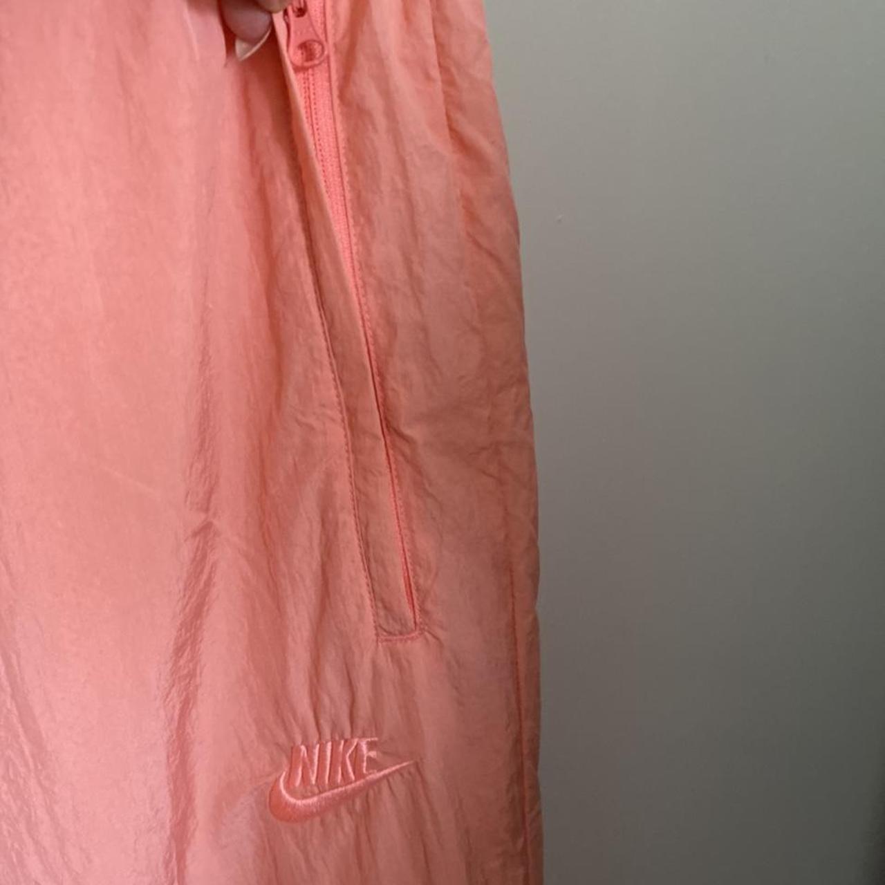 Peach nike 2024 jogging suit