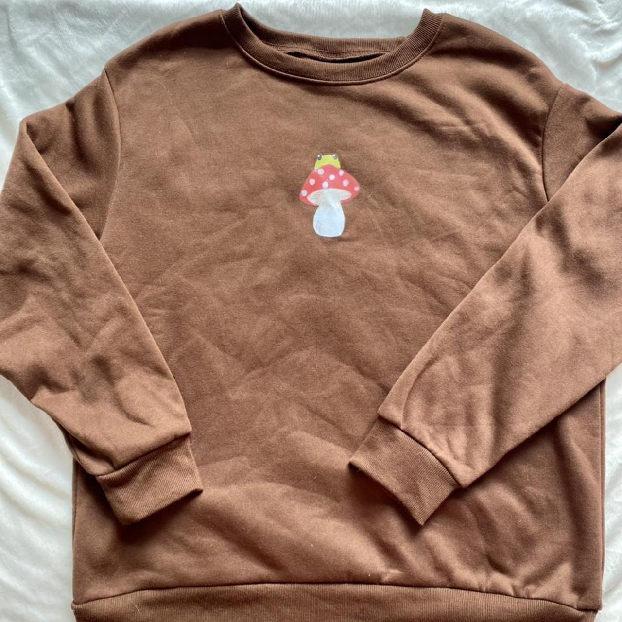 cute jumper with frog and toadstool motif from shein... Depop