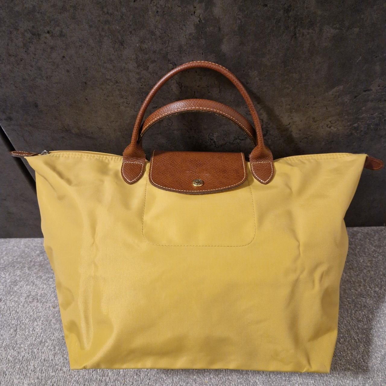 Longchamp Le pliage short handled foldable mustard... Depop