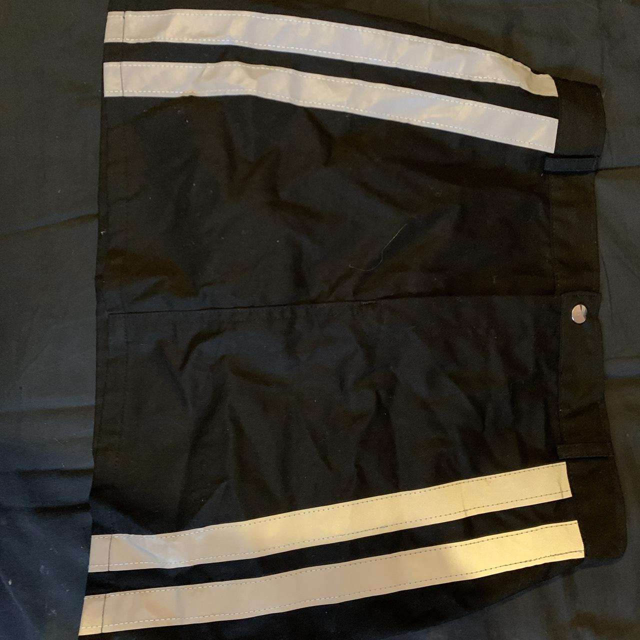 zip up reflective skirt, never worn only selling as - Depop