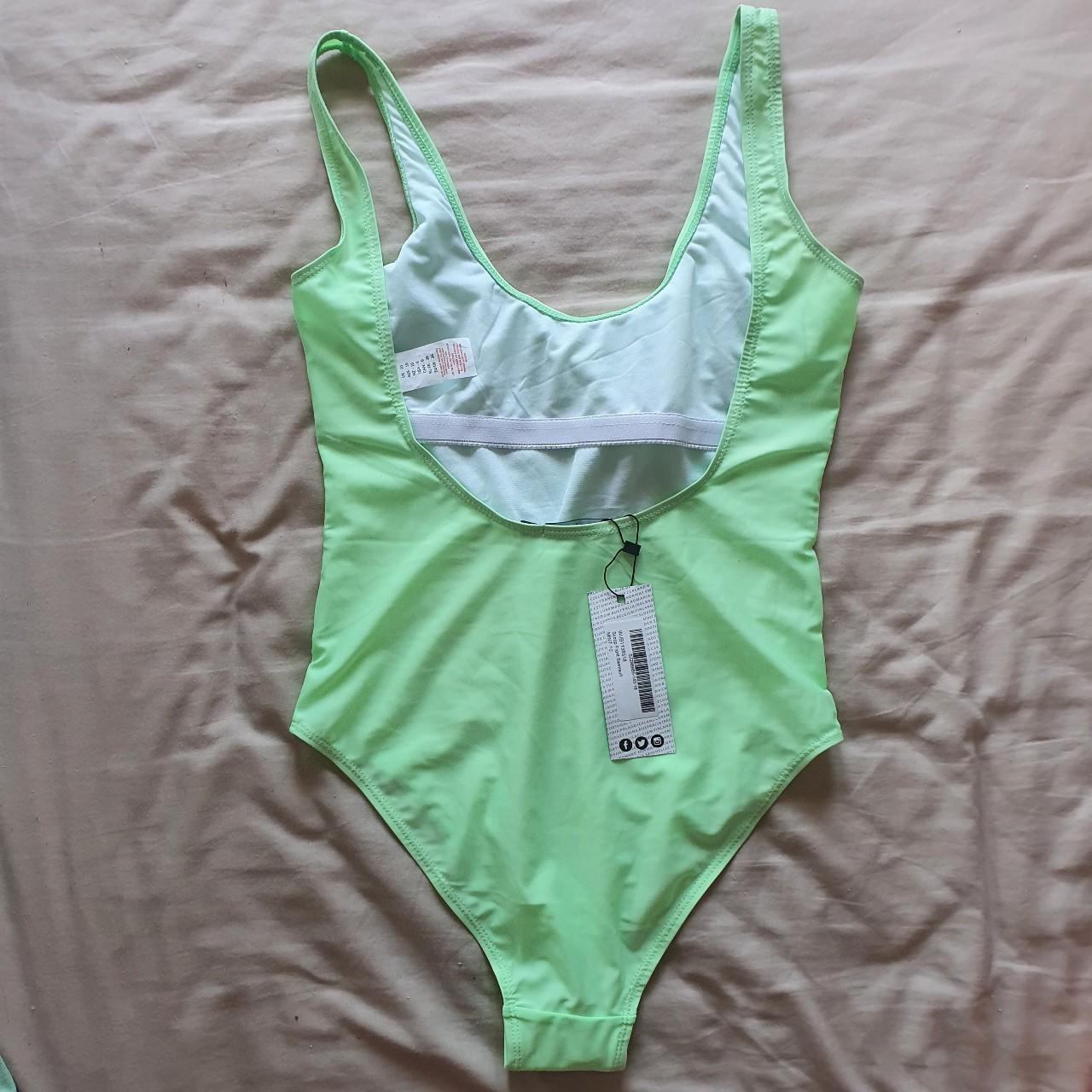 Brand new lime green swimsuit from boohoo with tags... Depop