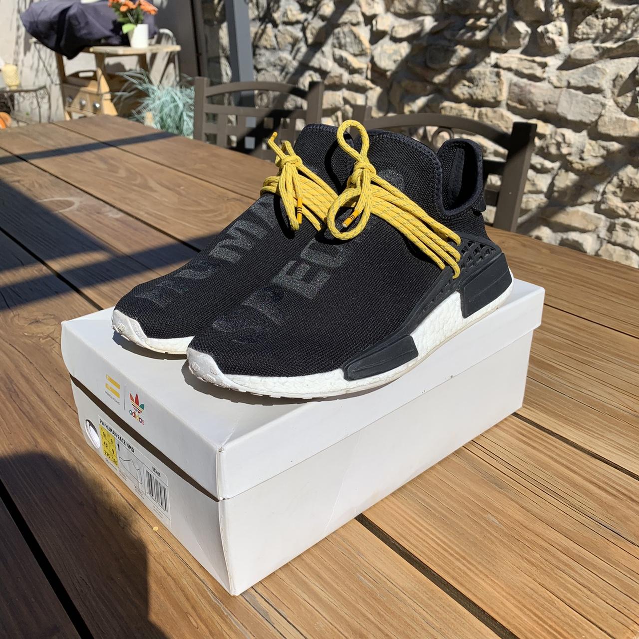 Human race black and yellow on sale