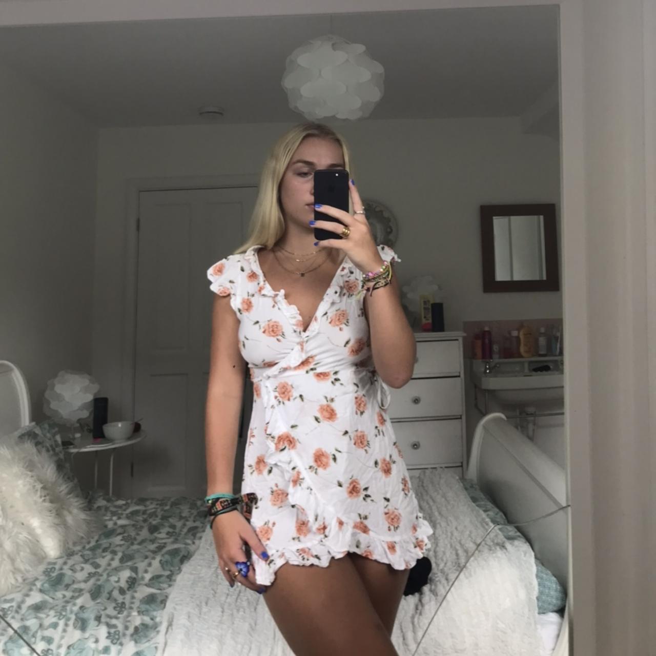 White floral wrap dress with frill detail