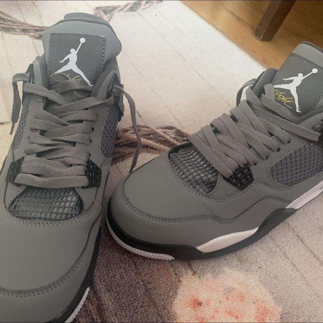 grey jordan 4's
