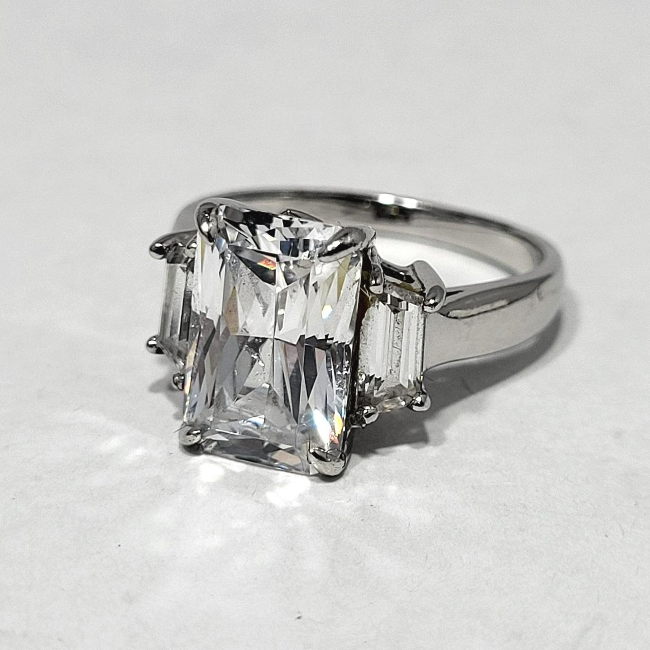 Large Emerald Cut CZ Three Stone Accented Sterling... - Depop