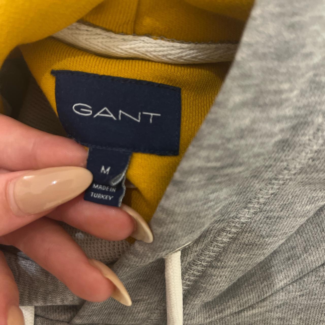 Grey gant hoodie with white logo and yellow... - Depop