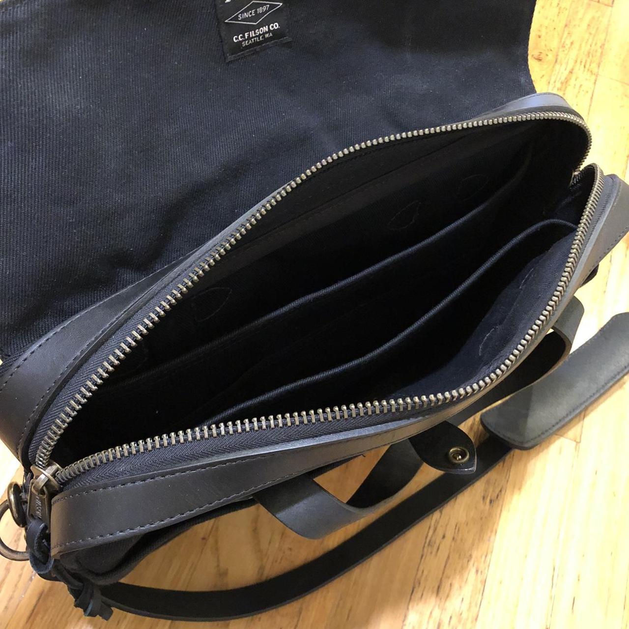 filson laptop bag for work has 2 dividers... Depop