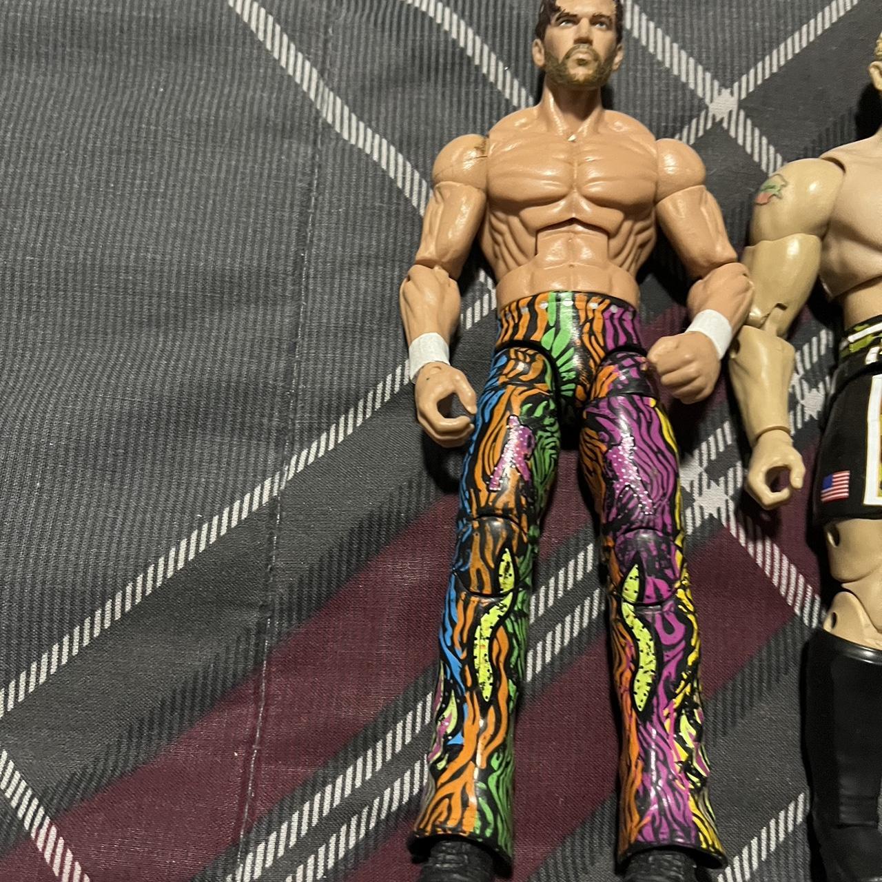 Lot of four WWE action figures Lot of 4 WWE action... Depop