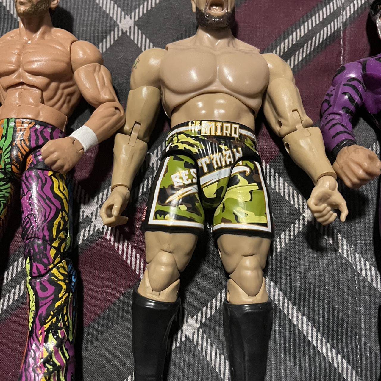 Lot of four WWE action figures Lot of 4 WWE action... Depop