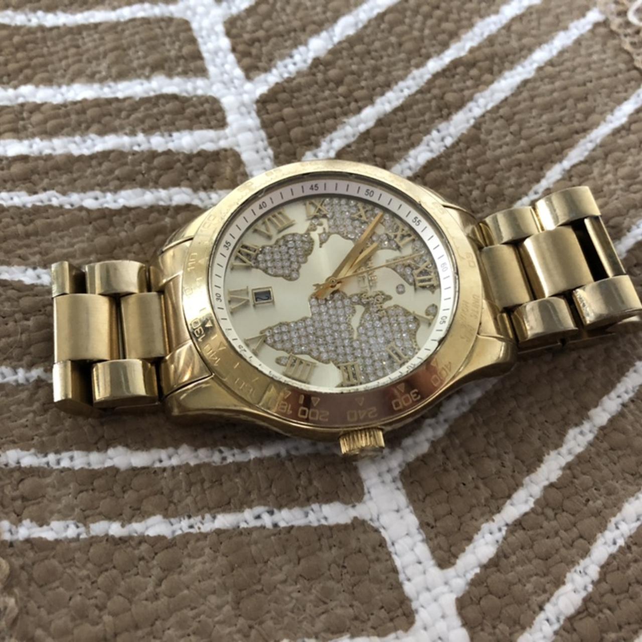 Michael kors world hot sale map watch rose gold