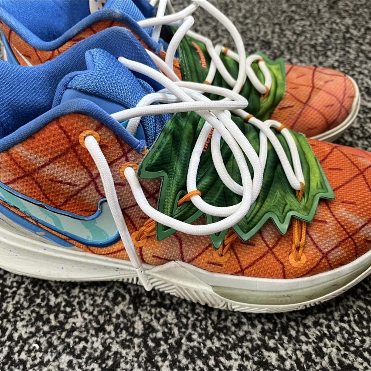 multi colour nike trainers