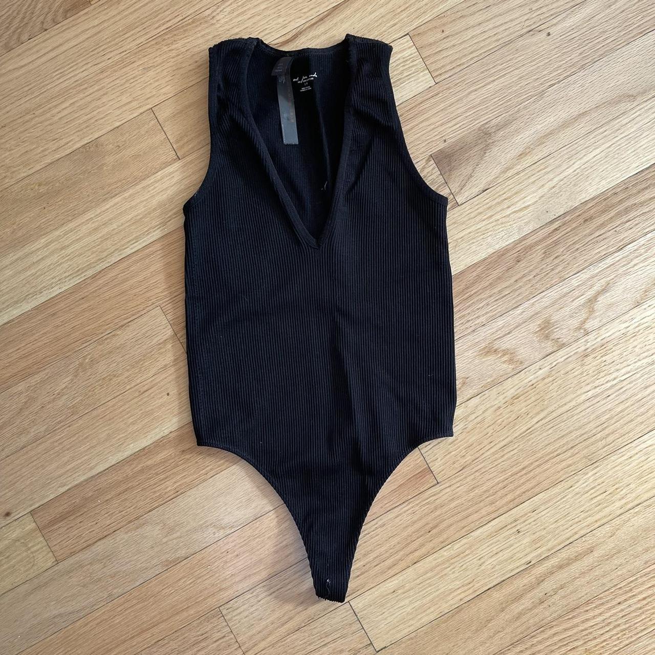 Super cute waist cinching bodysuit. Very versatile... Depop