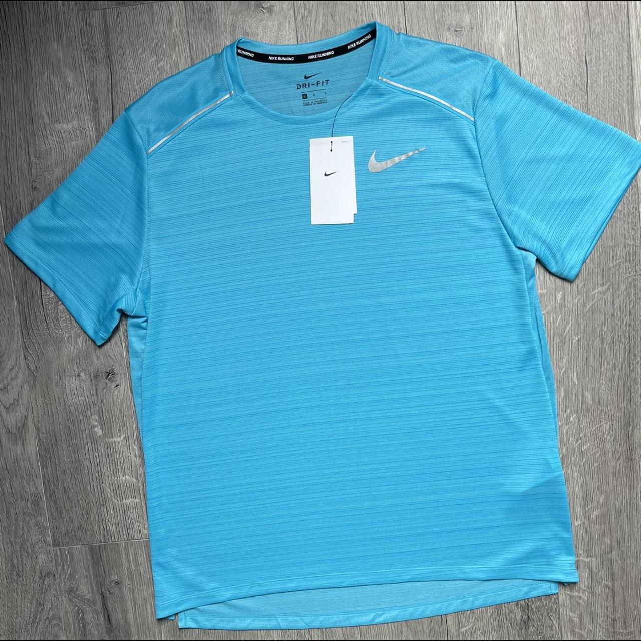 Nike Men's Blue T-shirt | Depop