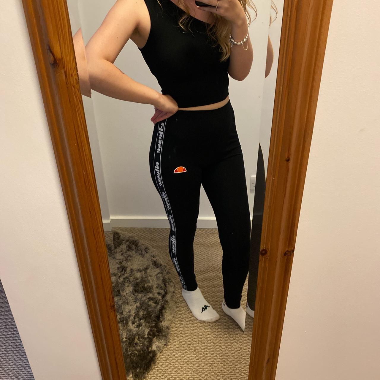 Black ellesse leggings with detailing down the side Depop