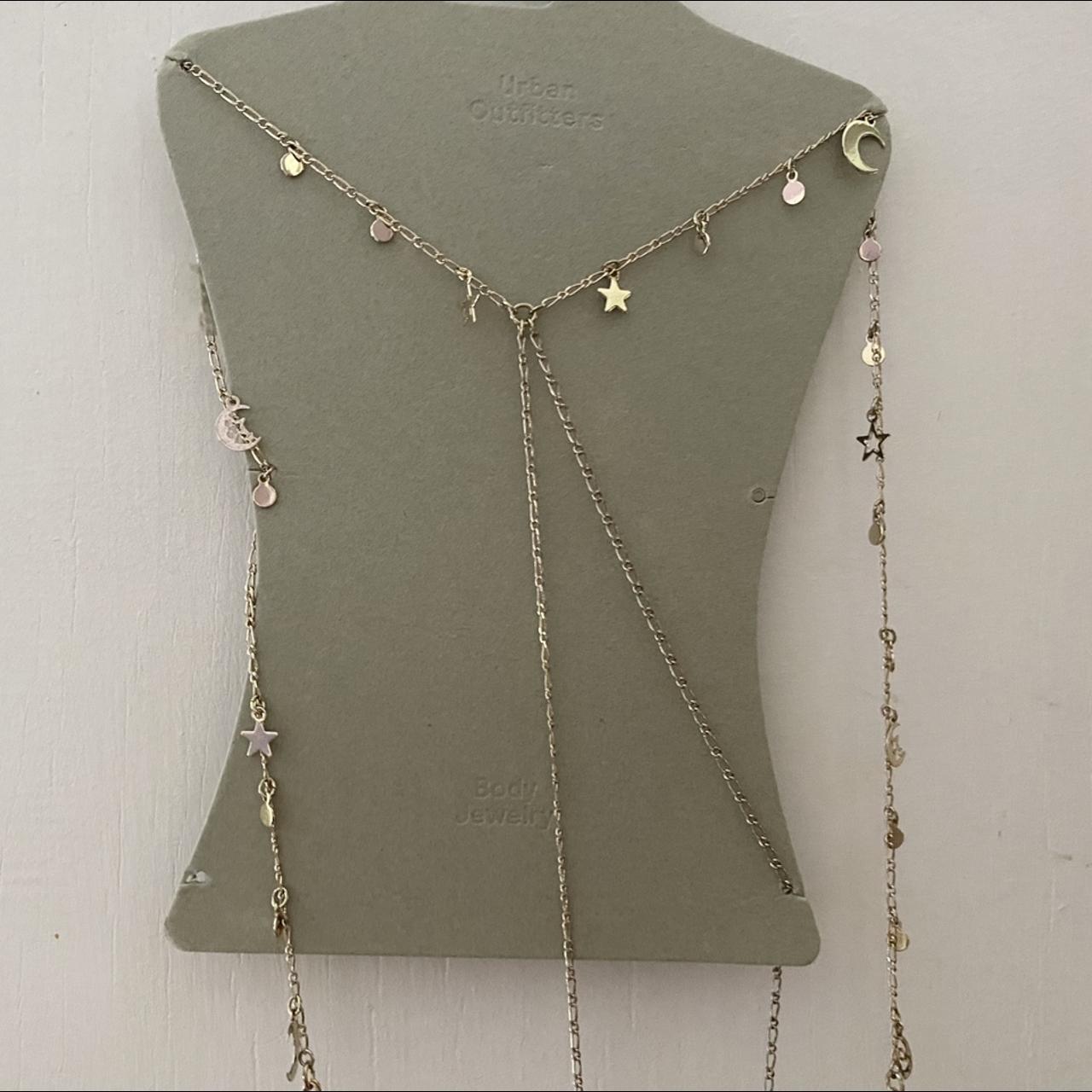 Urban Outfitter Celestial Body Chain in gold — never... Depop