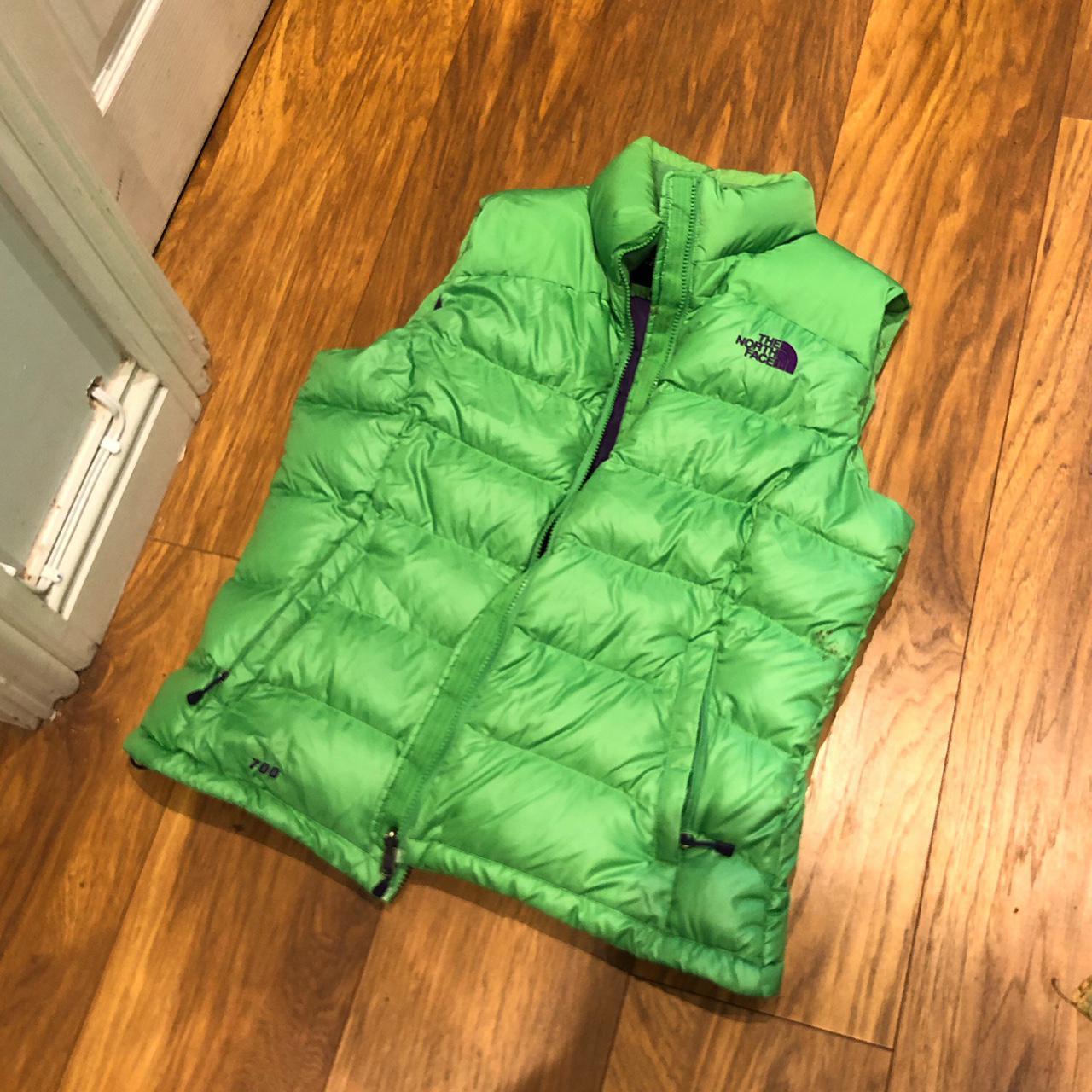 green north face puffer vest