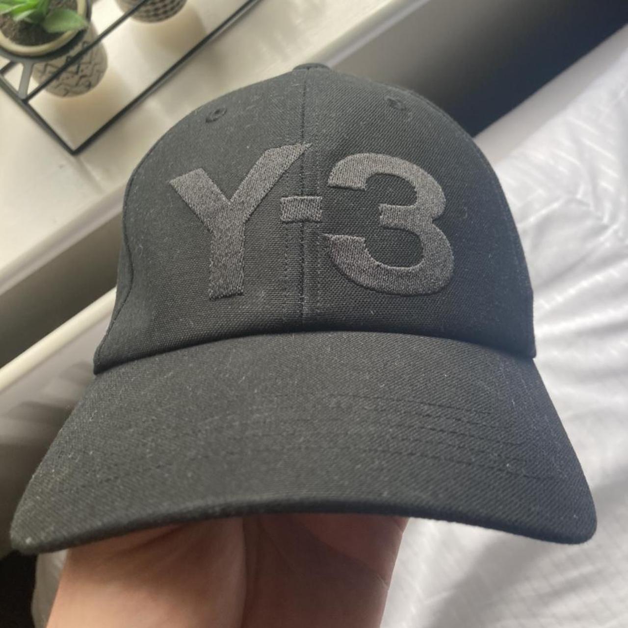 black yeezy hat