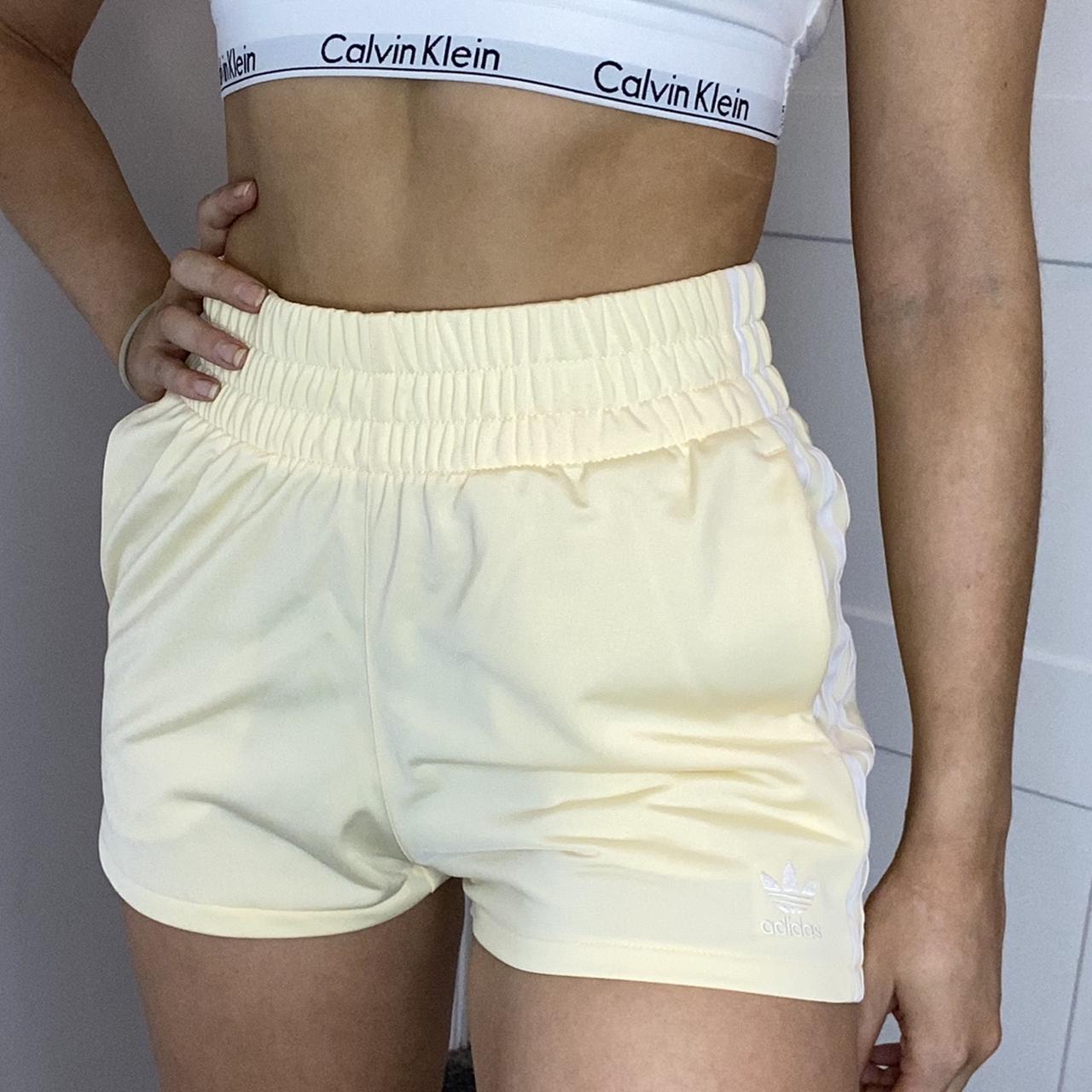 pastel yellow adidas shorts