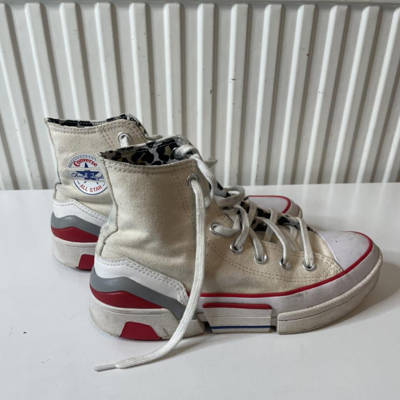 Converse platform hightop trainers in a size 4,... Depop