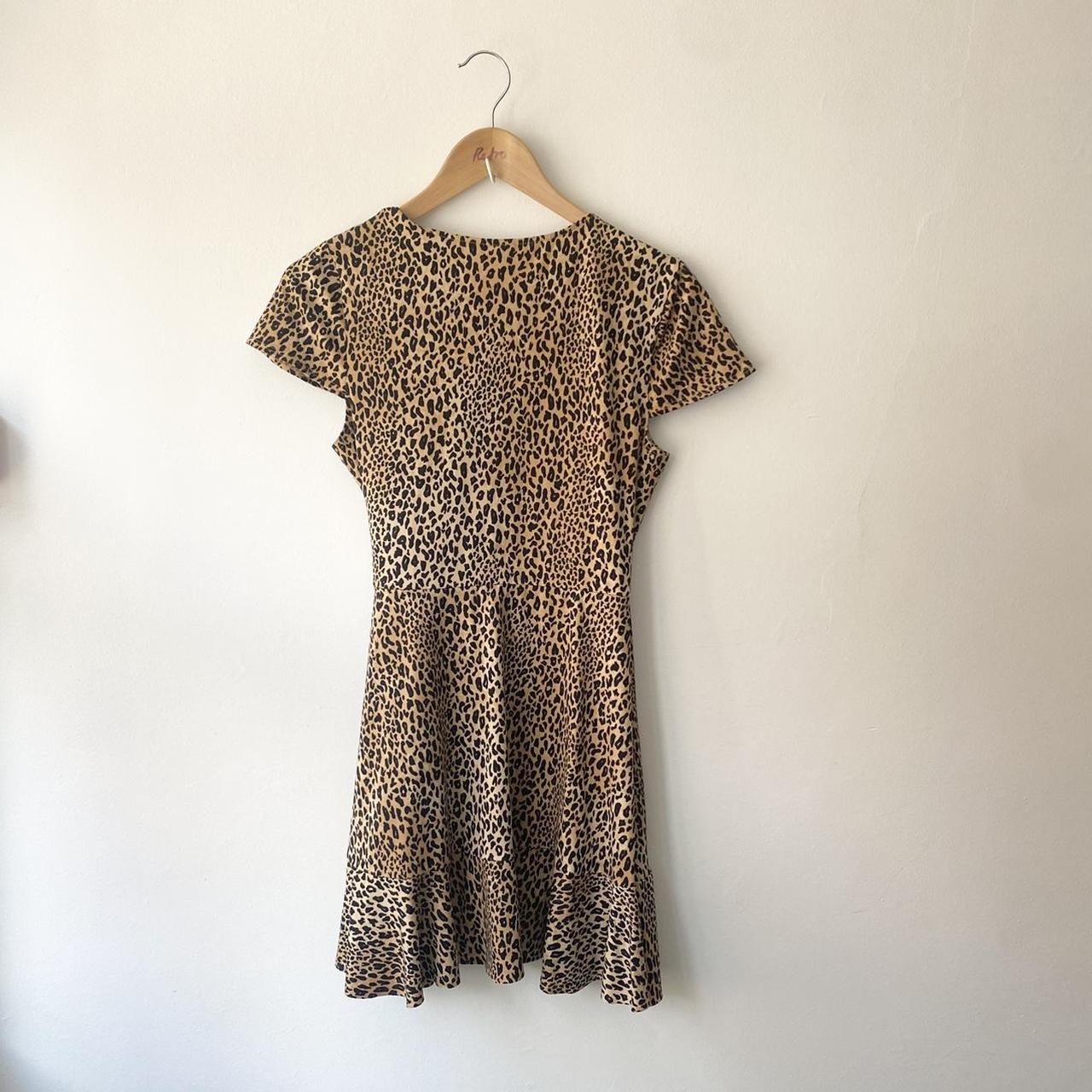 H&M leopard print wrap mini dress with frill... - Depop