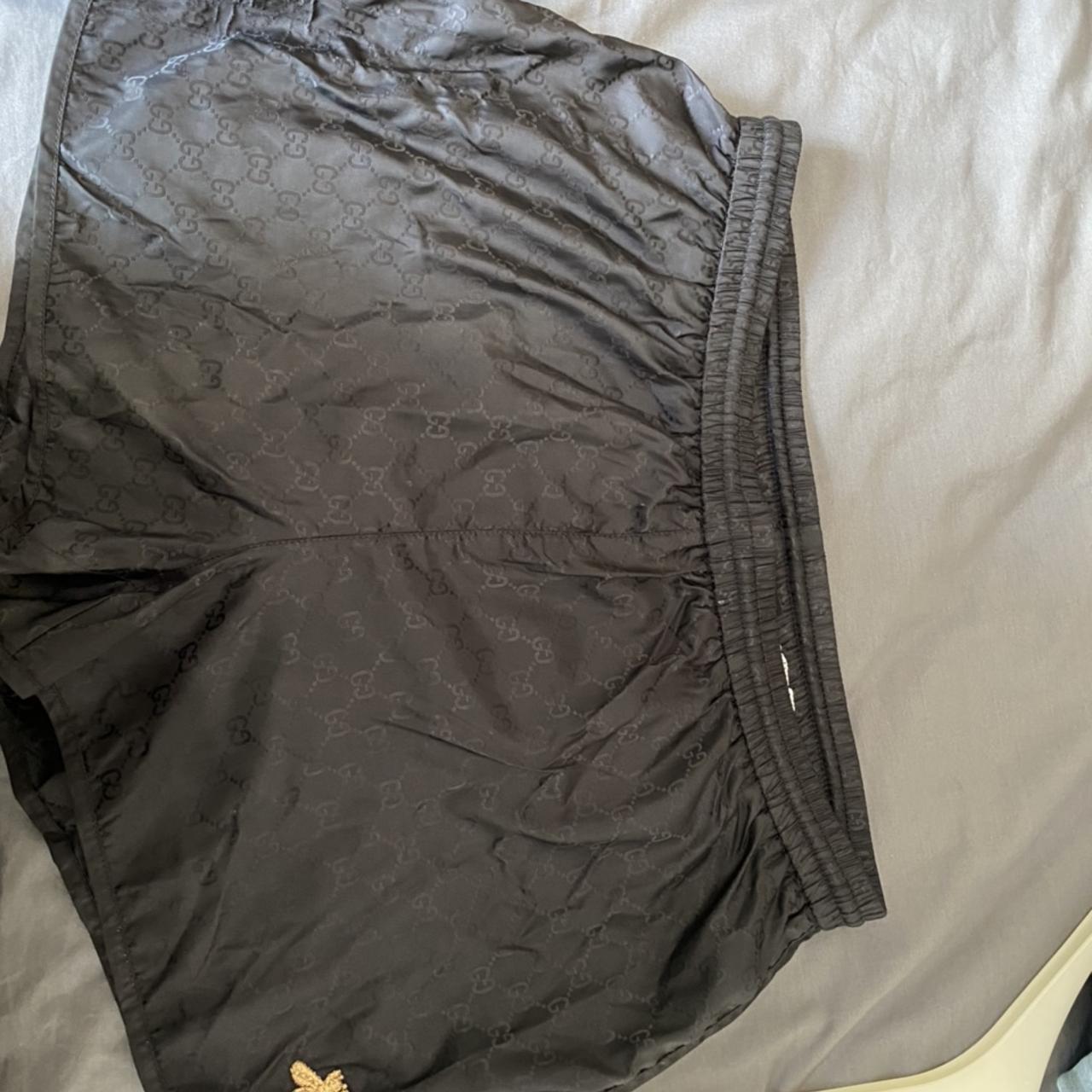 Gucci Men's Gold and Black Shorts | Depop