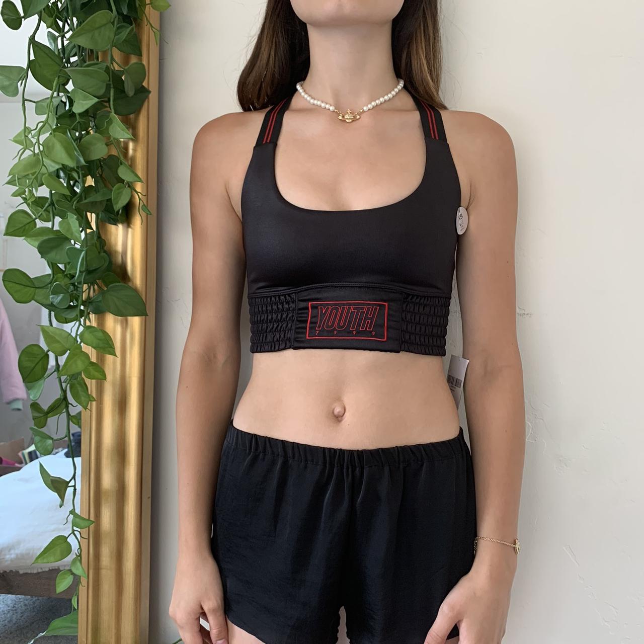 Forever 21 Black and Red Sports Bra. It says Youth - Depop