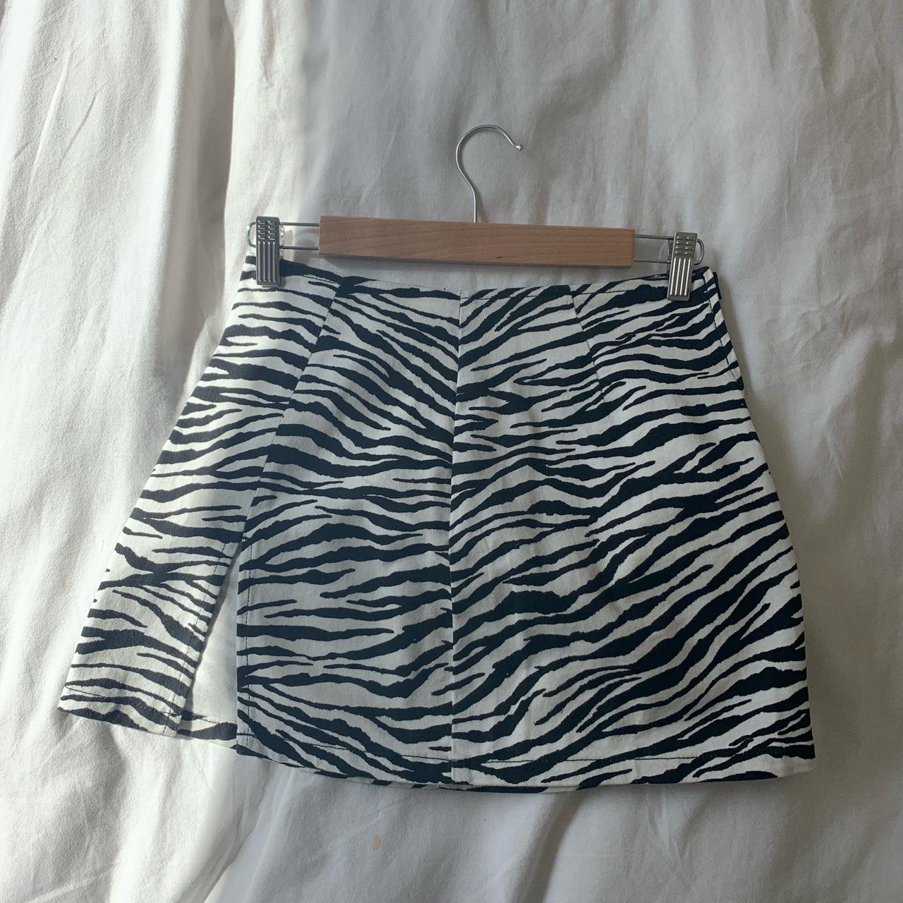 Adorable zebra miniskirt with side slit from Depop