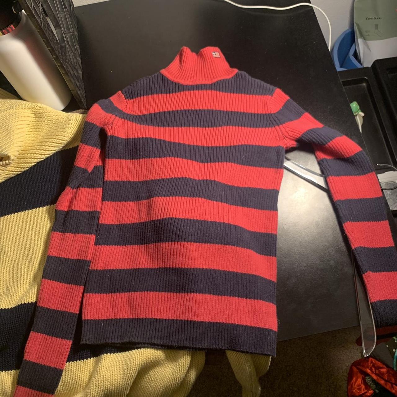 red and black striped turtleneck