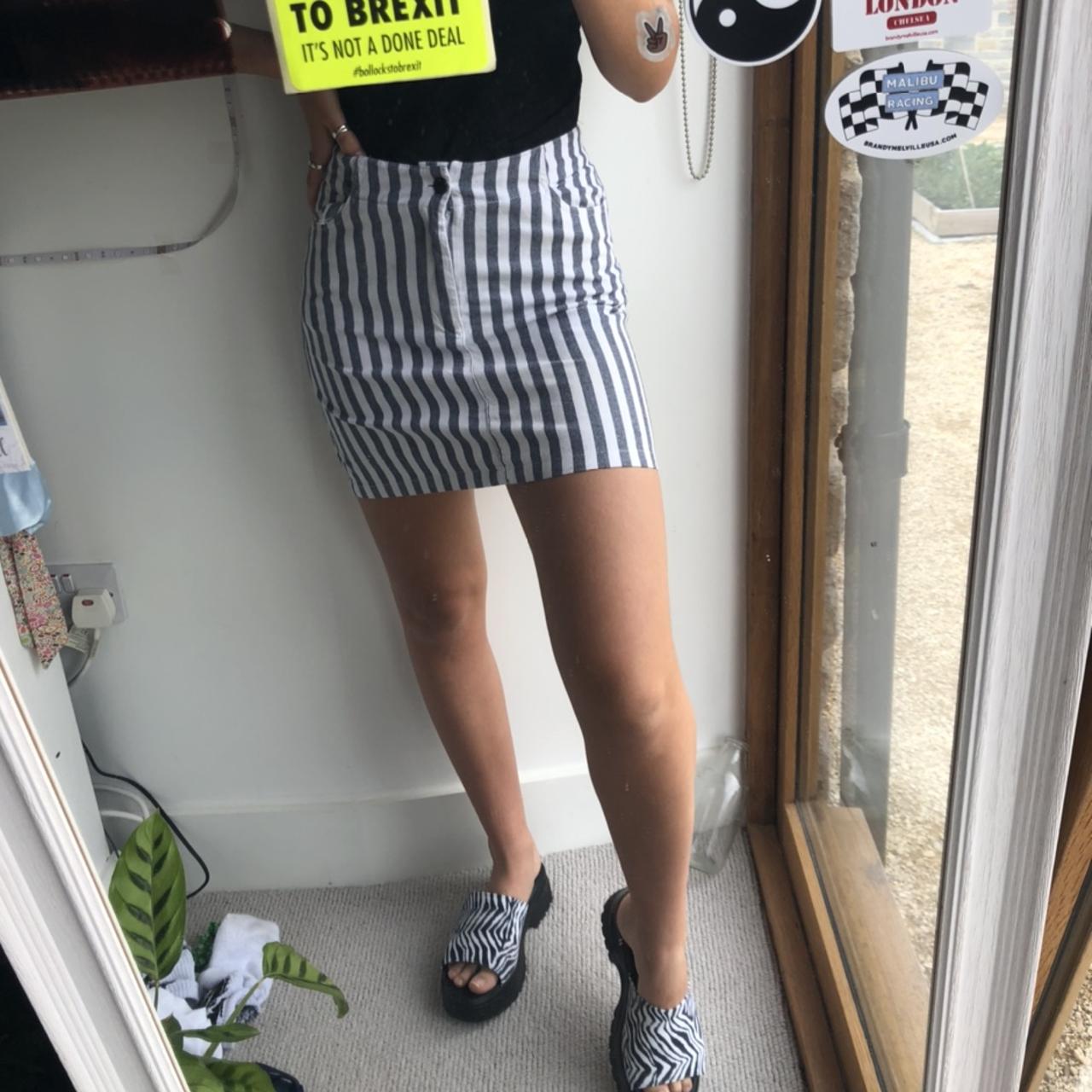 really cute brandy melville skirt grey and white... Depop