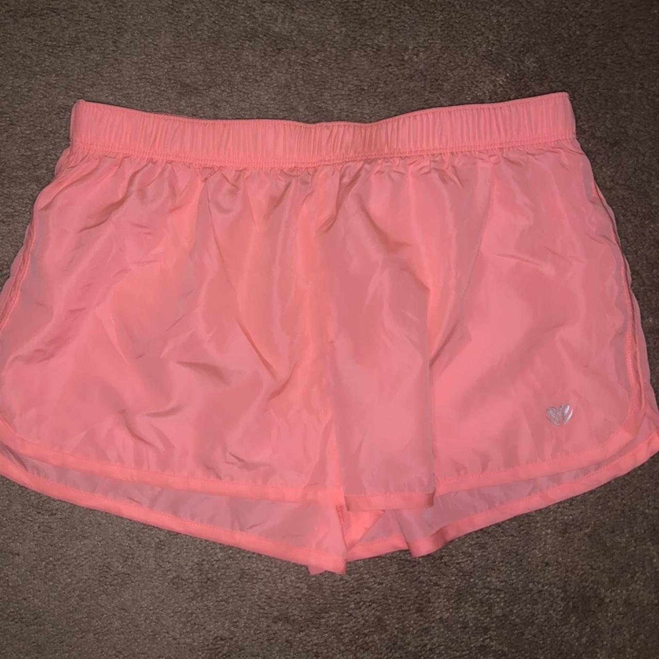peach color nike shorts