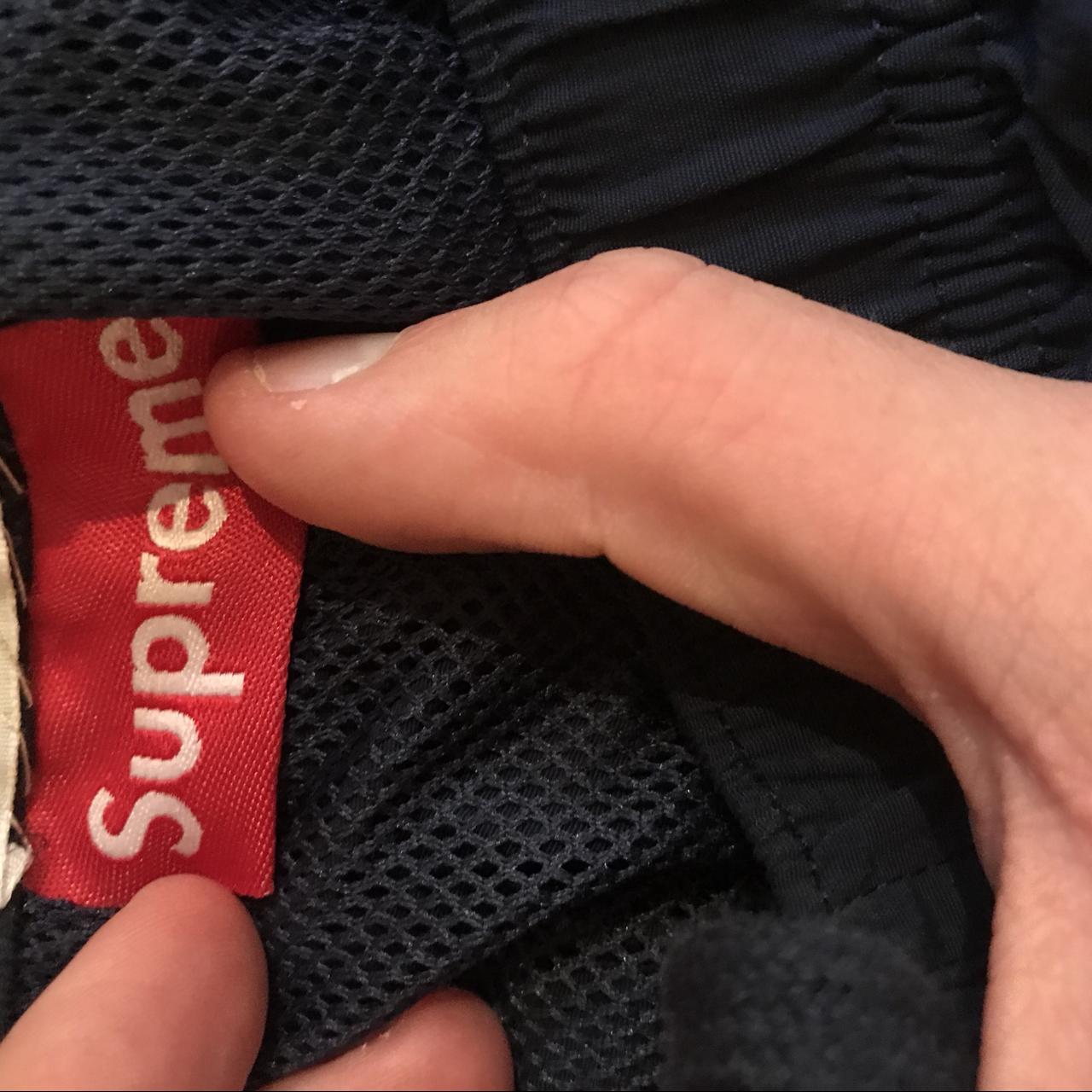 Supreme track pants navy in good condition a little - Depop