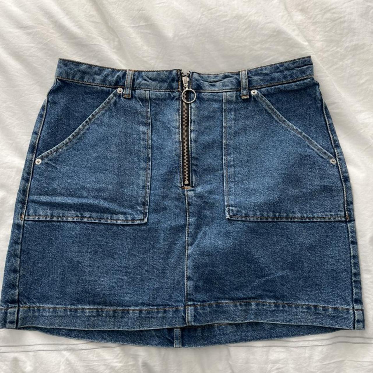 Topshop dark blue denim skirt Ring detailing... - Depop