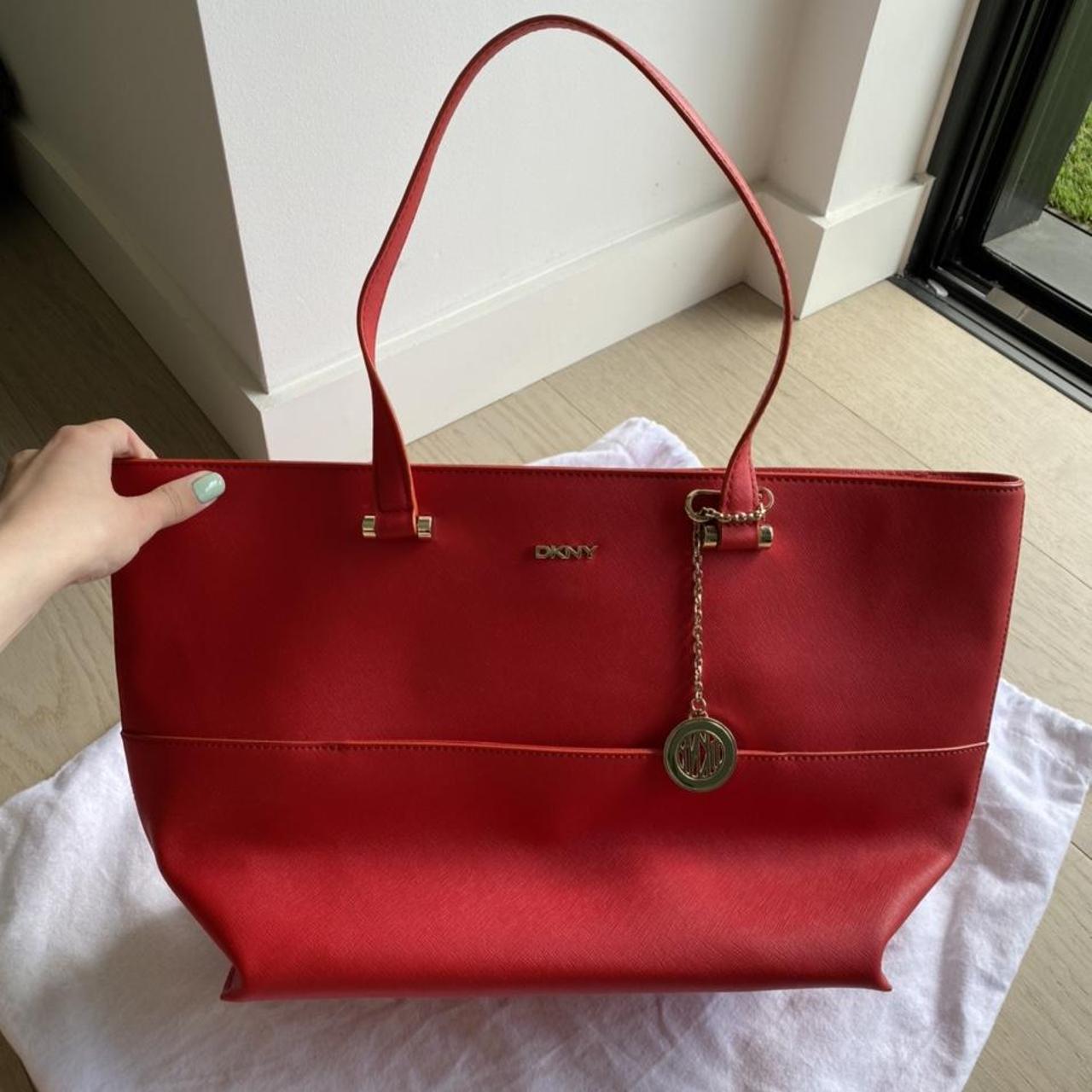 Authentic/real DKNY red shoulder bag never worn.... Depop