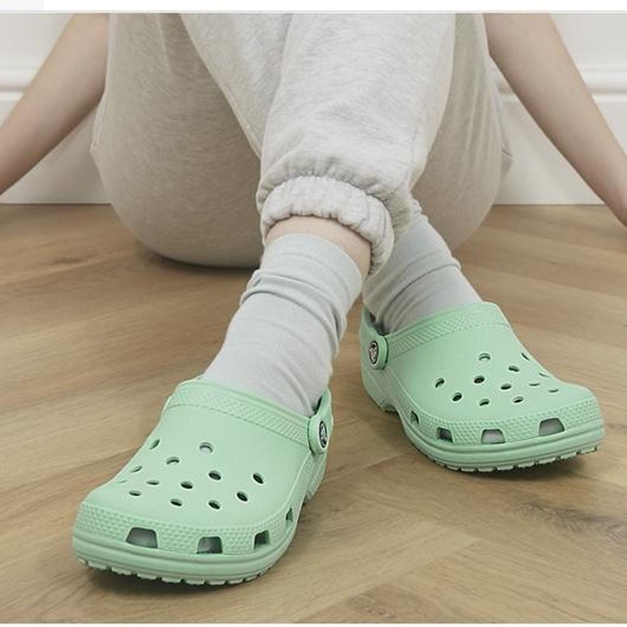 mint green crocs