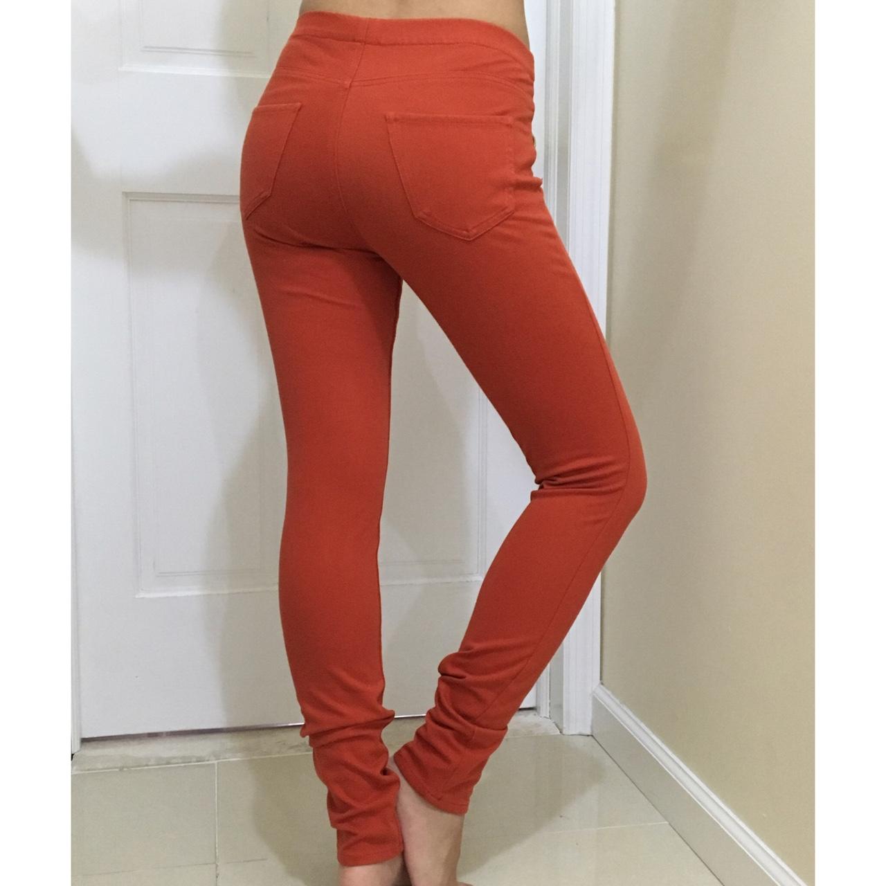 Look at this sexy orange jeggings from Uniqlo! Tag - Depop