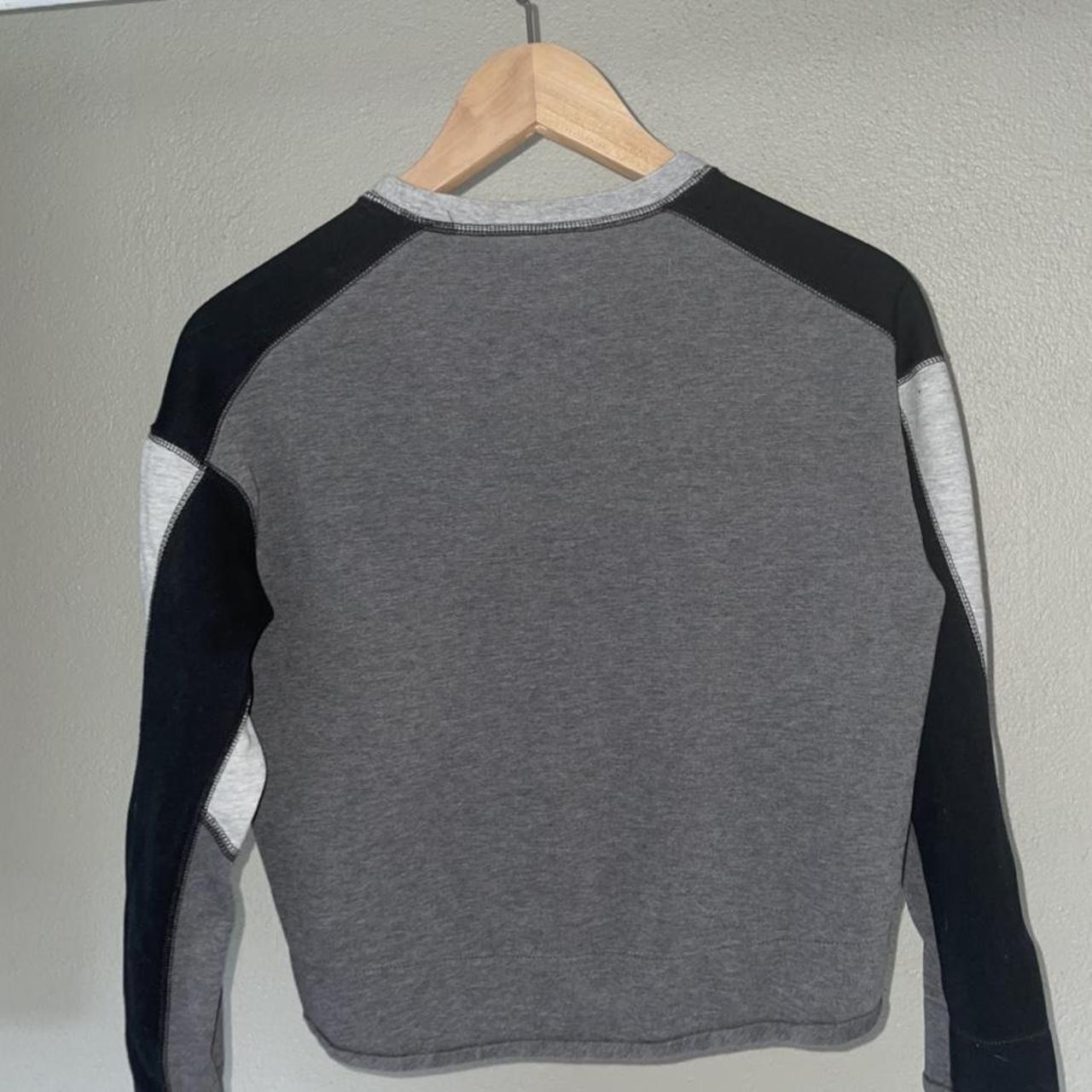 swoosh sweater