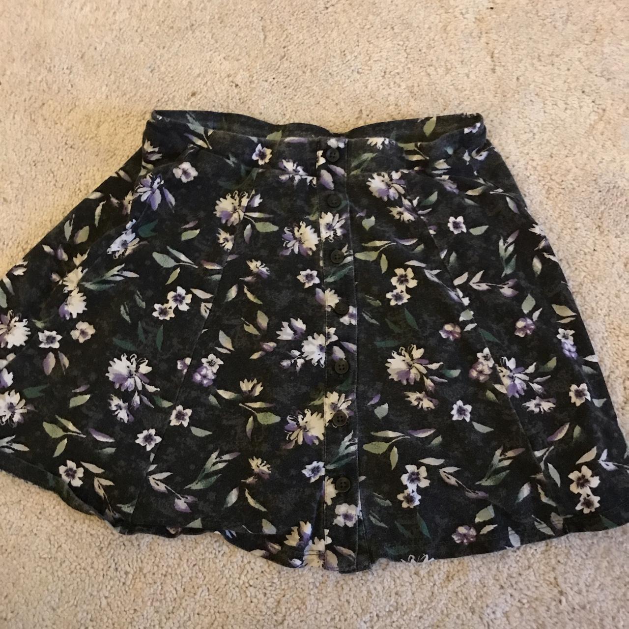 super cute short button up skirt! the flowers are... - Depop