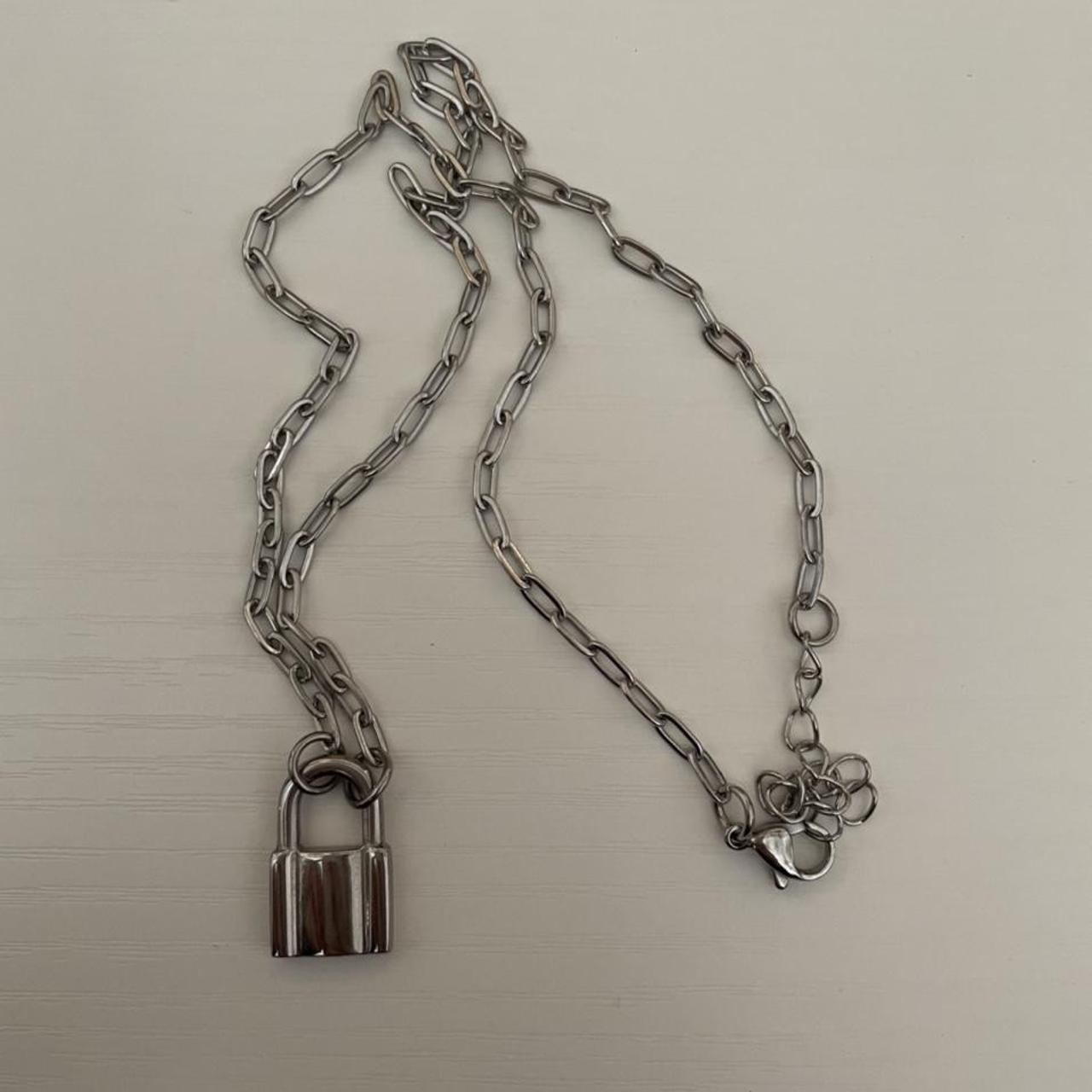 Brandy Melville lock necklace, one side of the lock... - Depop