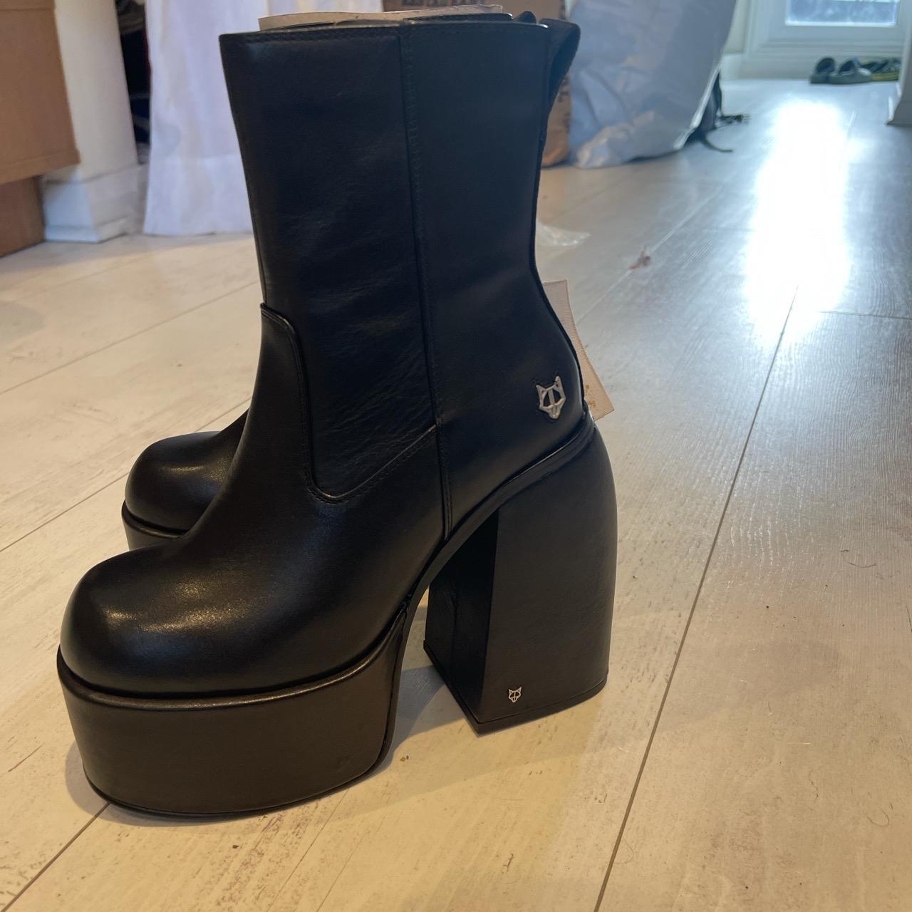 Naked Wolfe Women's Black Boots Depop