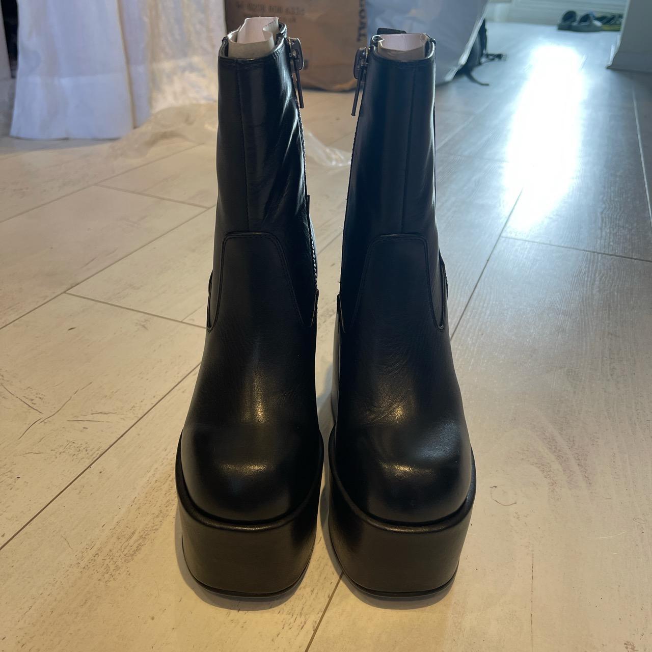 Naked Wolfe Women's Black Boots Depop