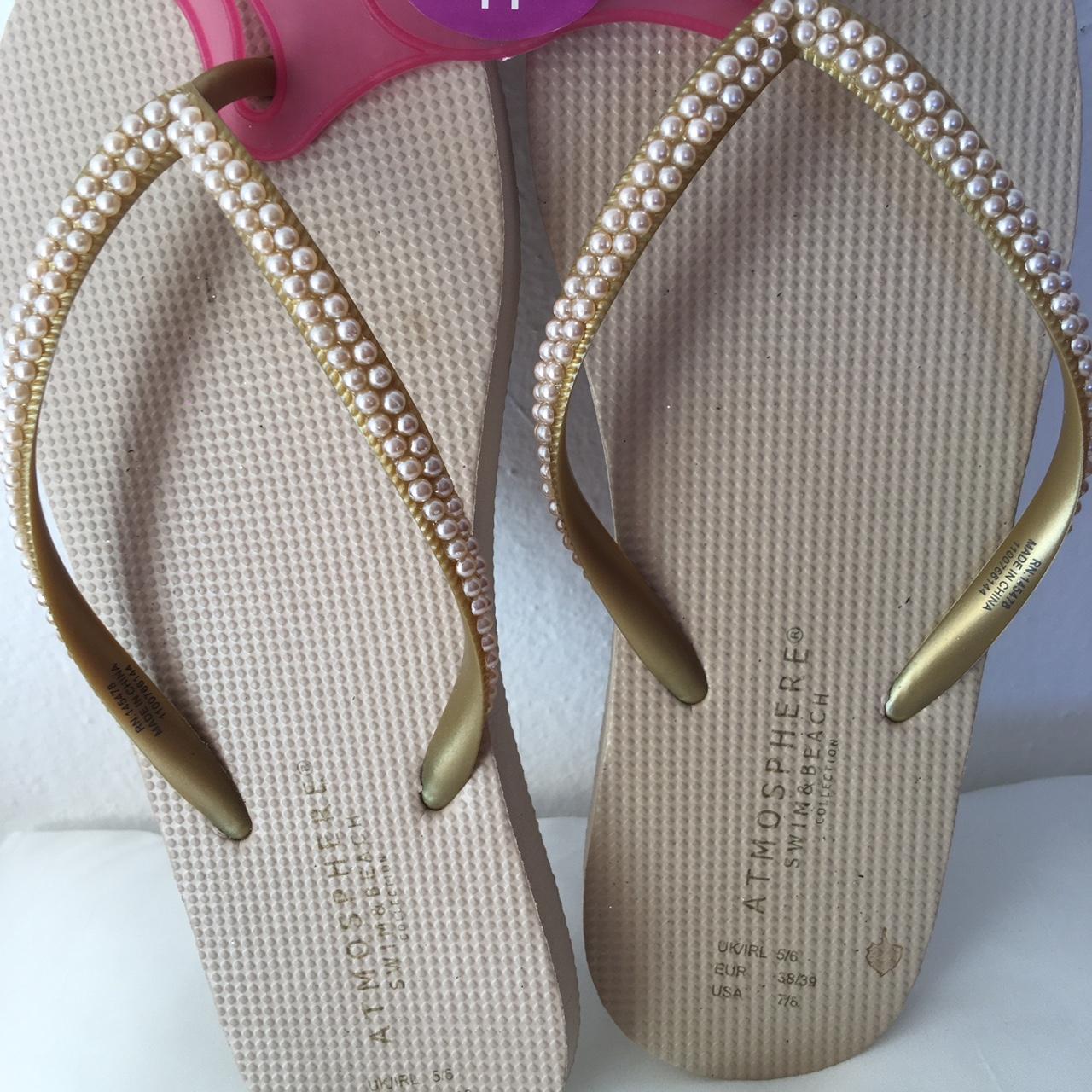 Swarovski store flip flops