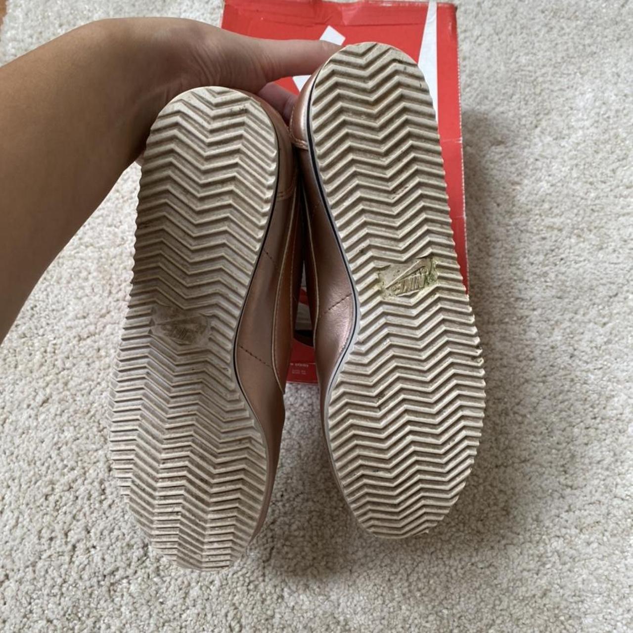 black nike cortez with rose gold