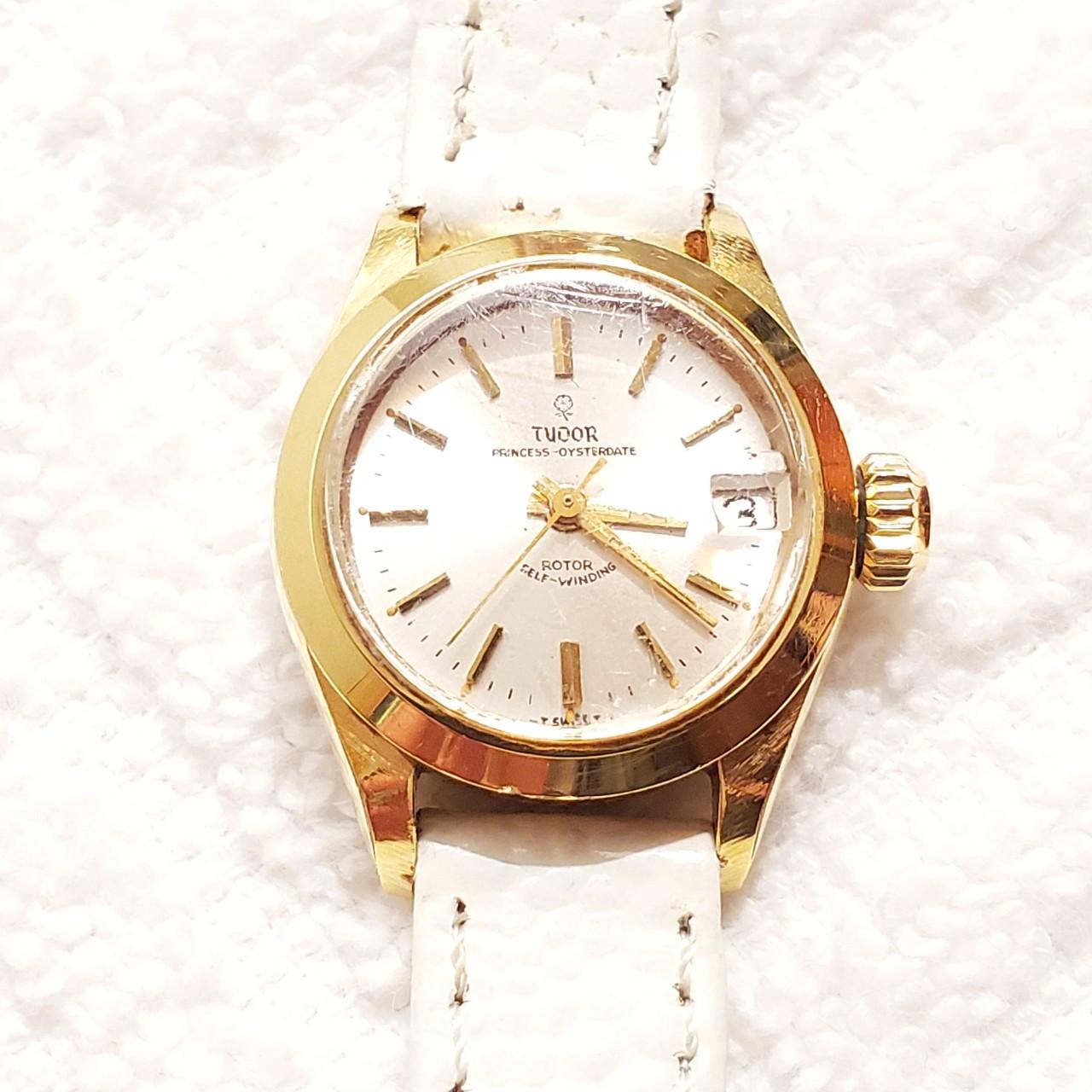 Rolex Women's White and Gold Watch
