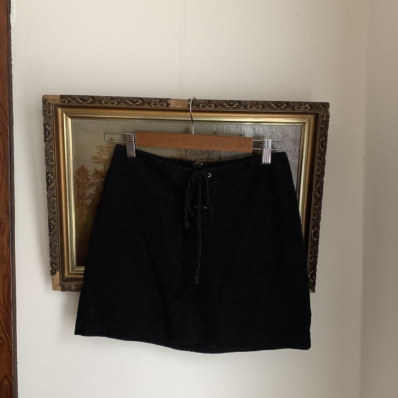 Black corduroy a-line mini skirt with lace-up tie in...