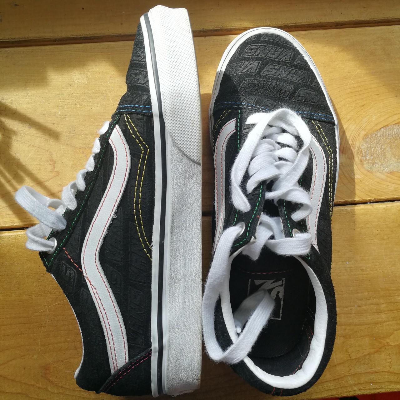 black vans with rainbow stitching