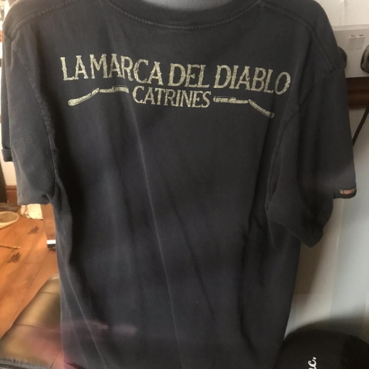 La marca del discount diablo t shirt