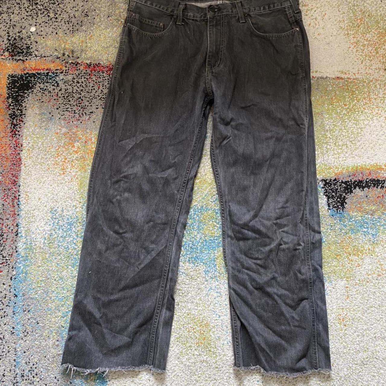 Vintage washed black carhartt jeans leg snipped to a... - Depop