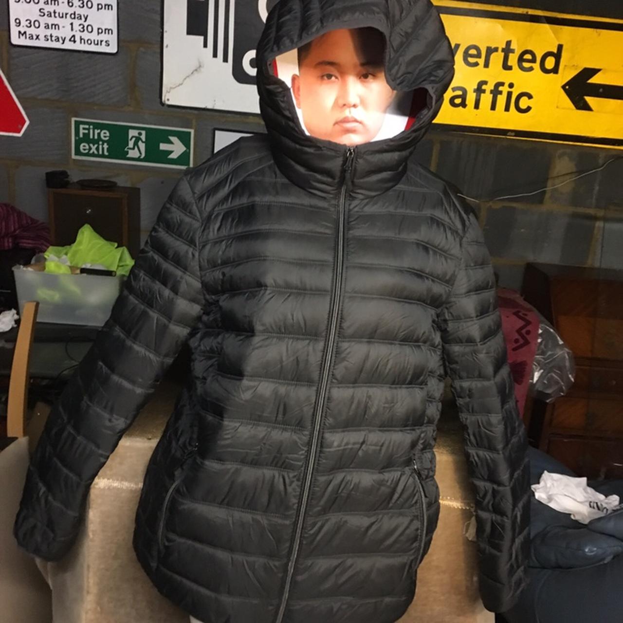 Celio lightweight puffer jacket folds into hood like