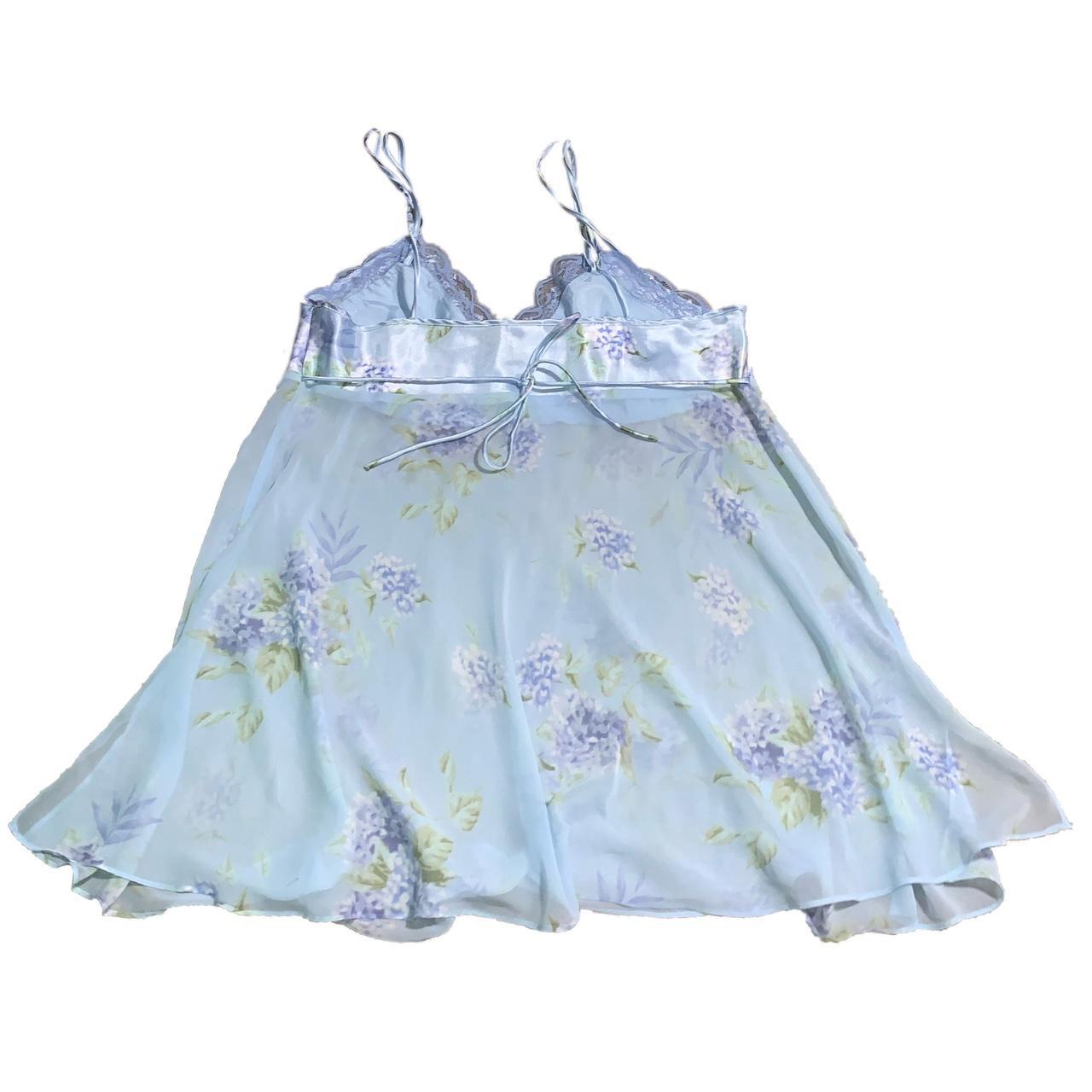 light blue floral slip dress with silky material on... Depop
